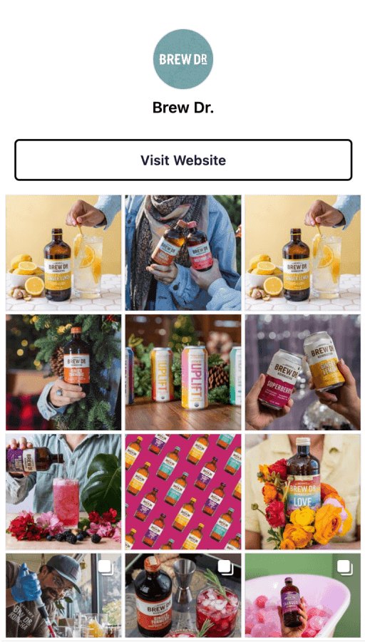 Screenshot of Brew Dr Kombucha's Link in Bio page with a button to visit their website and a grid of their latest posts that link out to other relevant content
